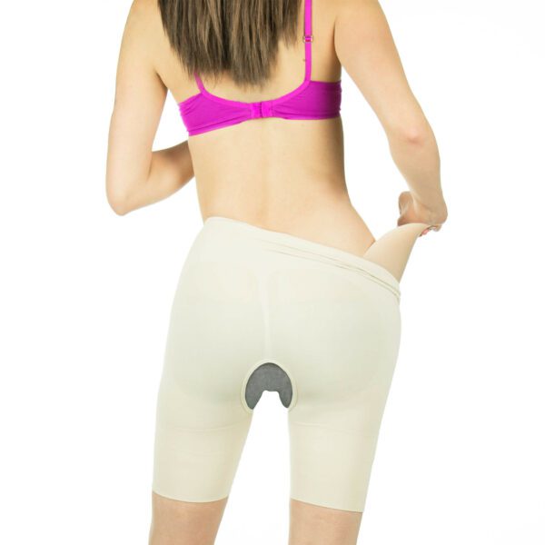 Rear view crossdressing crotchless garment with hip pad